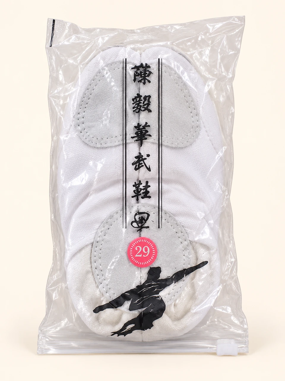 White Martial Arts Shoes on a warm studio background