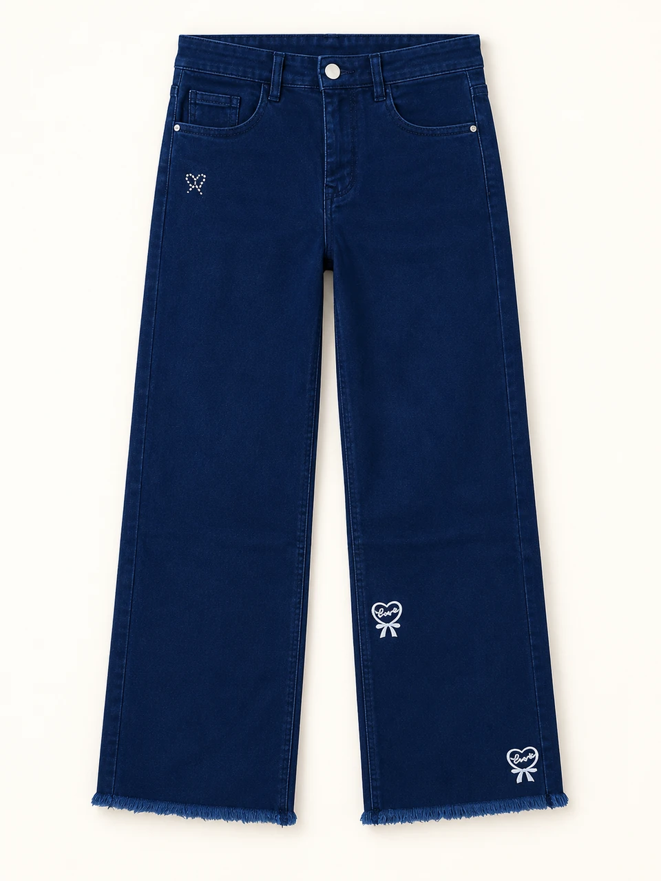 Dark Blue Heart Detail Frayed Jeans on a warm studio background