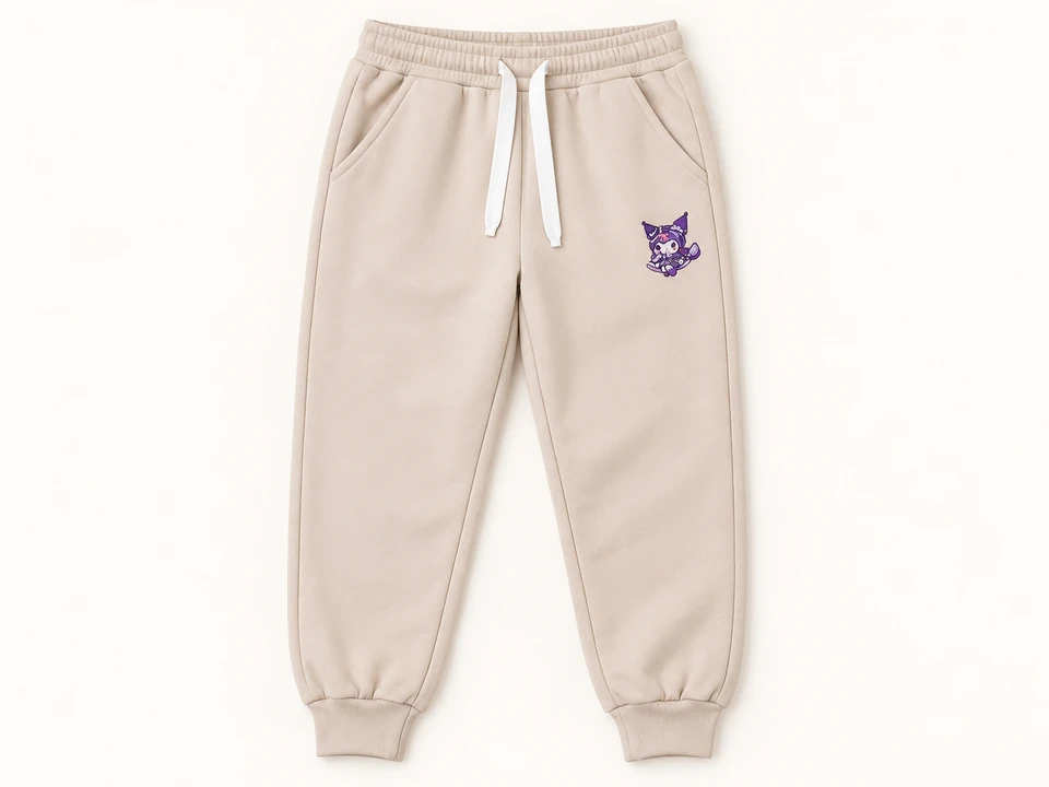 Beige Patch Cuffed Joggers on a warm studio background