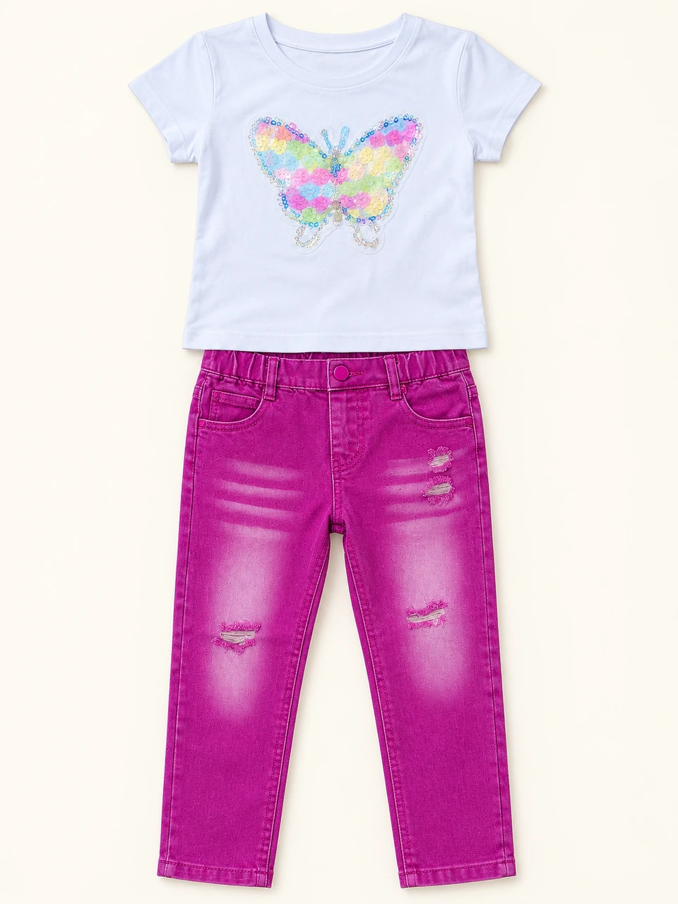Butterfly T-shirt and Magenta Jeans Set on a warm studio background
