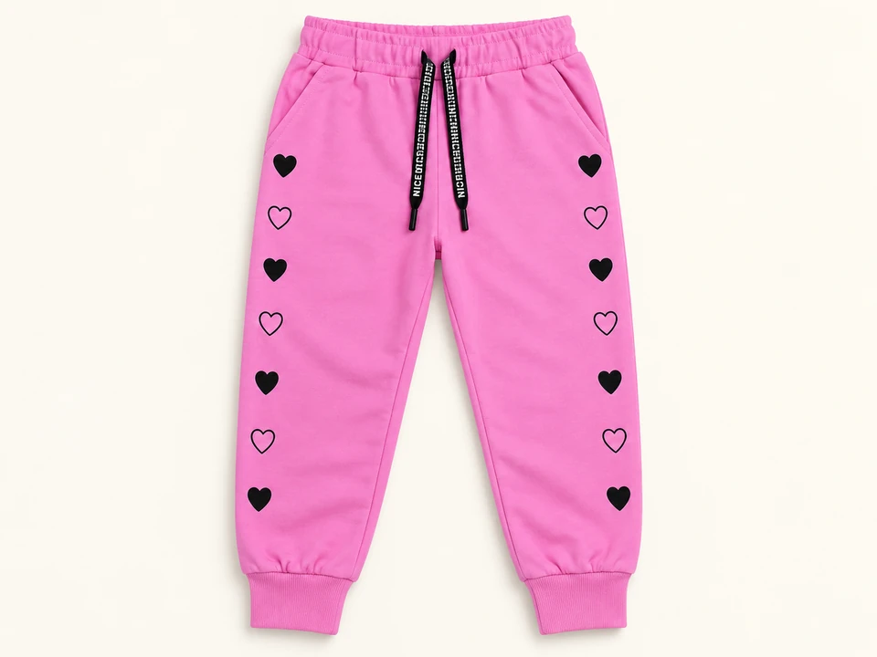Pink Seven-heart Cuffed Joggers on a warm studio background