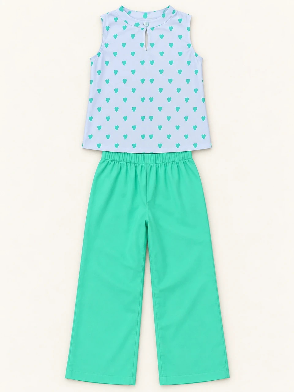 Mint Heart Top and Trouser Set on a warm studio background
