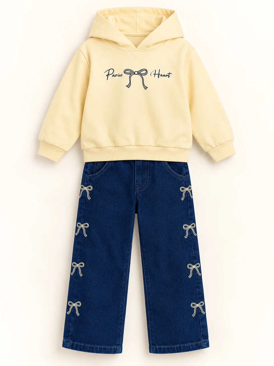 Yellow Bow Hoodie and Denim Trouser Set on a warm studio background