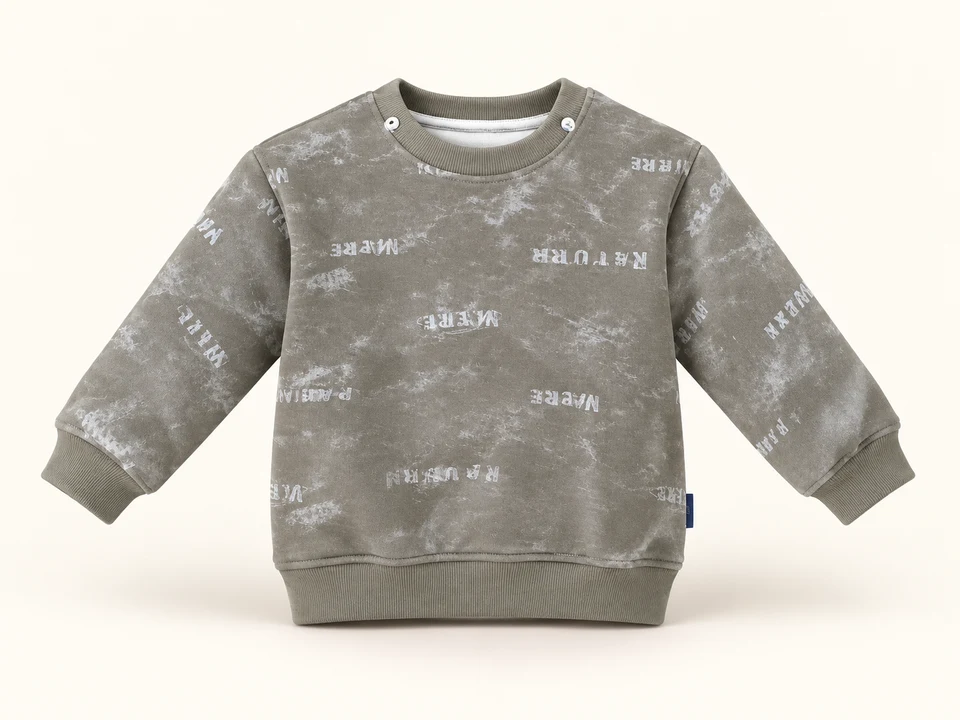 Grey Washed Print Sweatshirt on a warm studio background