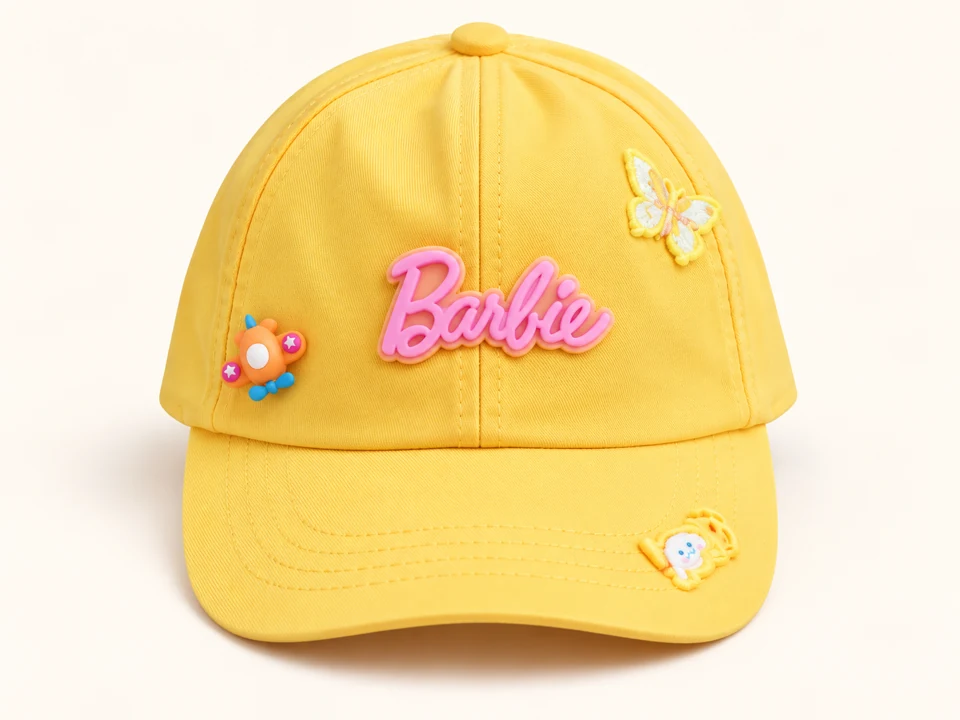 Yellow Barbie Decorated Cap on a warm studio background
