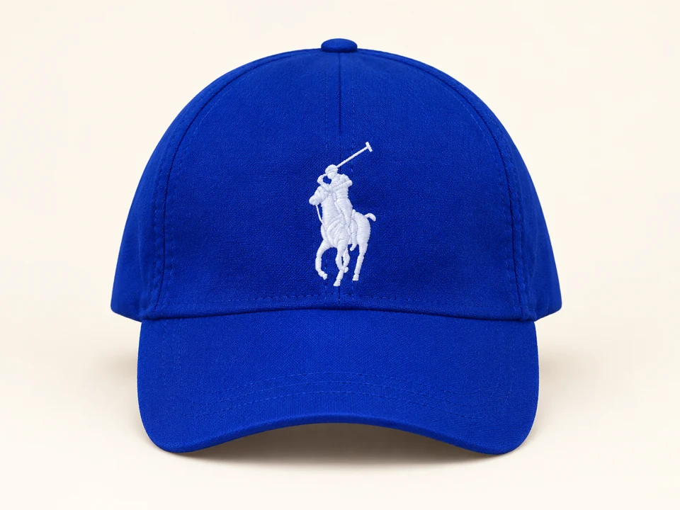 Royal Blue Embroidered Cap on a warm studio background